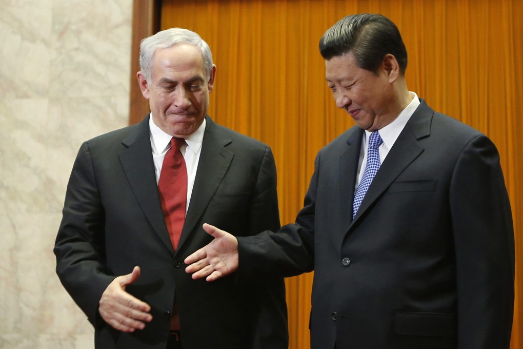 Israel's Prime Minister Benjamin Netanyahu shakes hands with China's President Xi Jinping at the Great Hall of the People in Beijing, in 2013. Photo: Reuters