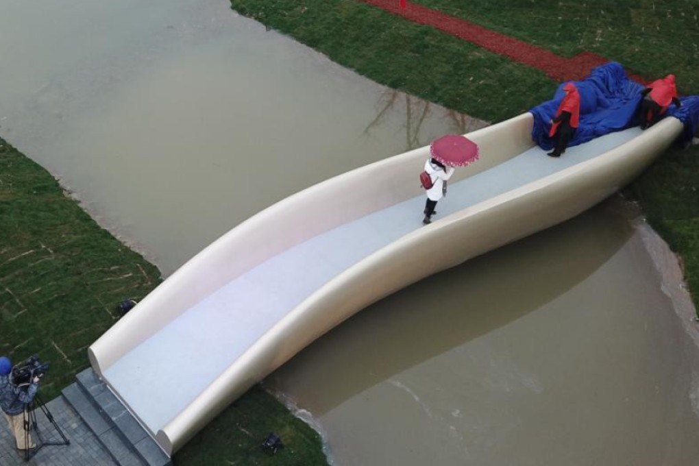 The new 3D bridge spans a small creek at Taopu Smart City in Shanghai. Photo: CNA
