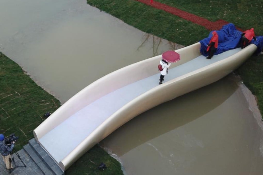 The new 3D bridge spans a small creek at Taopu Smart City in Shanghai. Photo: CNA