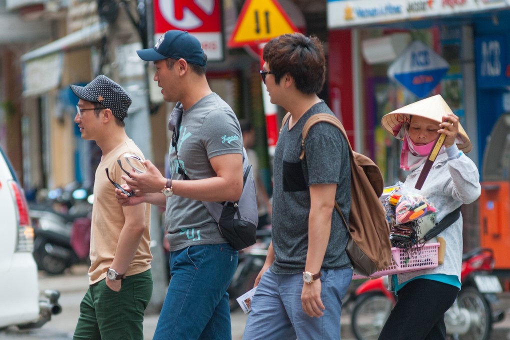 Tourists in Ho Chi Minh, Vietnam. Photo: Shutterstock