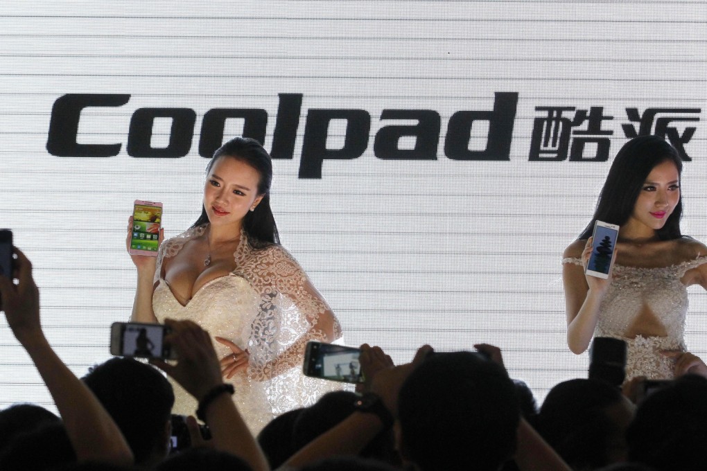 Models display Coolpad smartphones during the 2014 Tianyi Mobile Fair & Mobile internet Forum in Nanjing, east Chinas Jiangsu province, 27 June 2014.