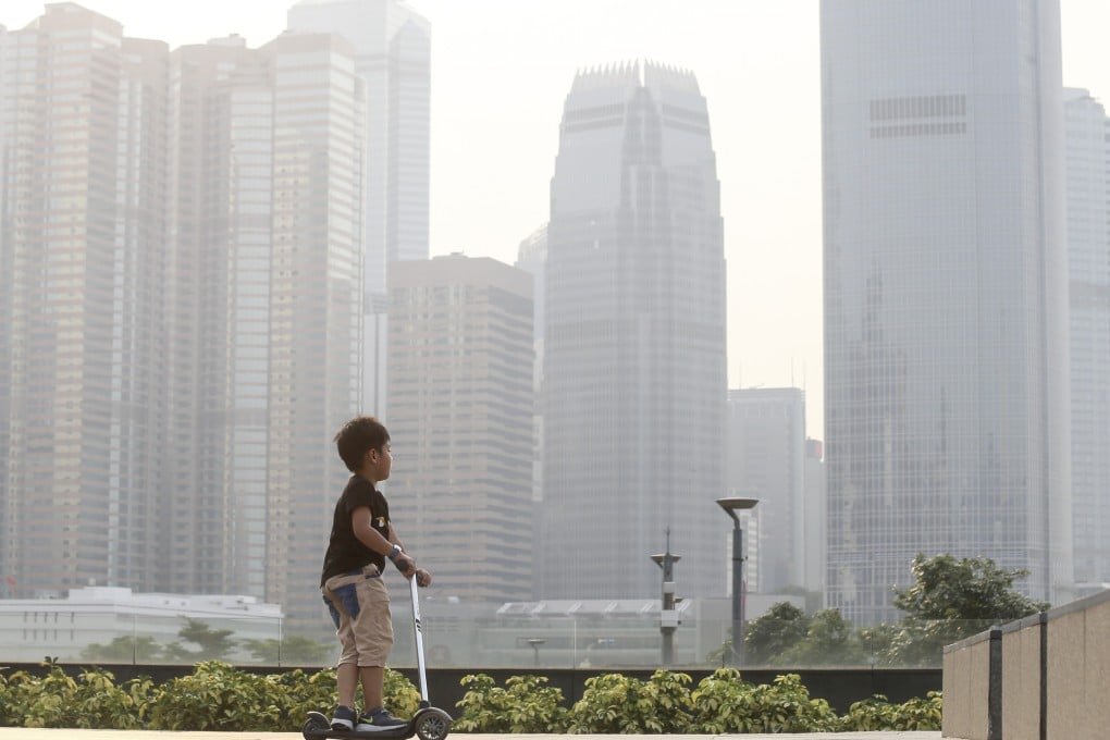 Haze hangs over the waterfront at Victoria Harbour. Photo: Dickson Lee
