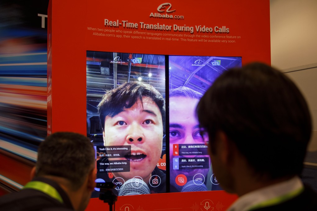Attendees interact with a real-time translator for video calls at the Alibaba booth during CES 2019 in Las Vegas. Photo: Bloomberg