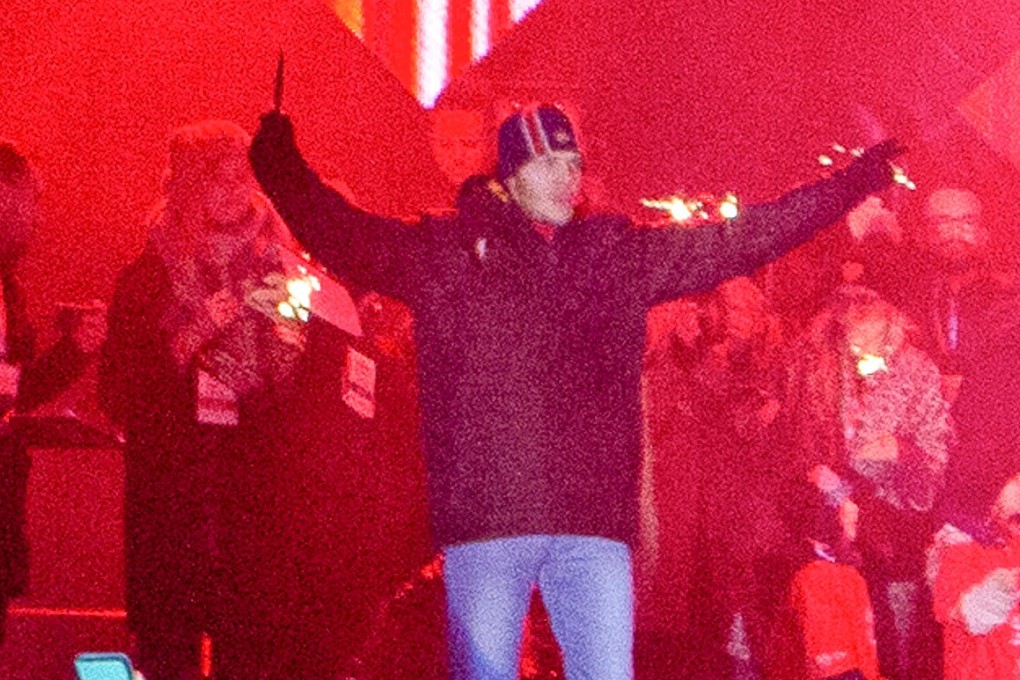The attacker holds up a a knife and shouts after stabbing Gdansk Mayor Pawel Adamowicz. Photo: Reuters