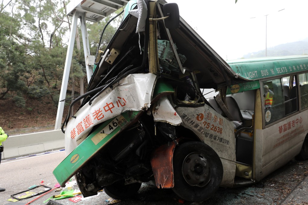 A police officer at the scene of the green minibus accident along Shing Mun Tunnel Road. Photo: Sam Tsang