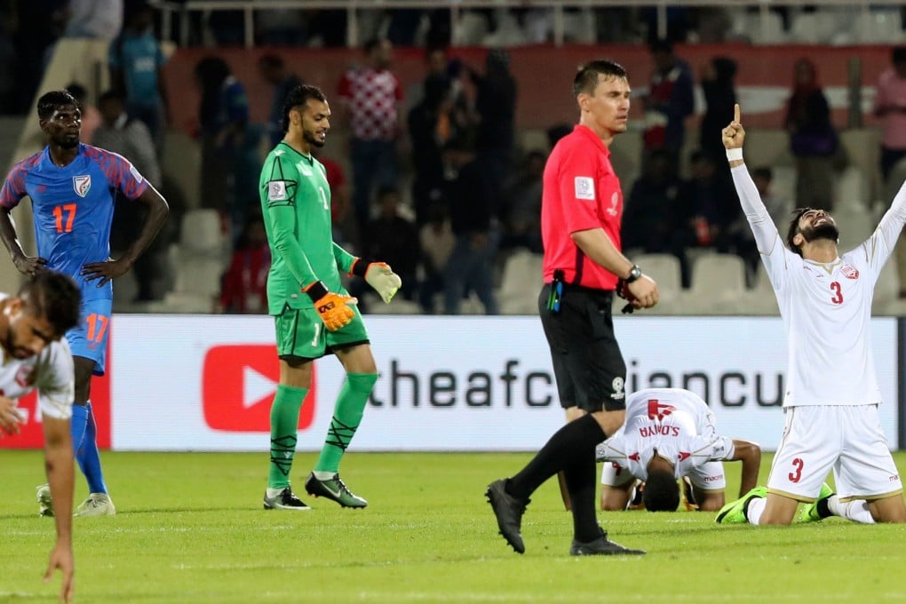 Bahrain defender Waleed Al Hayam (right) celebrates after winning the 2019 AFC Asian Cup group A football match against India. Photo: AFP
