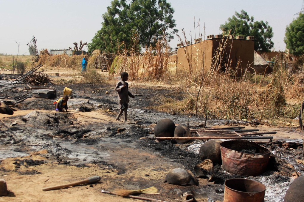 The burnt remains of a village on the outskirts of Maiduguri, Nigeria, on December 17, 2018, after Boko Haram fighters set fire to homes. The US and China recently collaborated on the removal of weapons-grade uranium from Nigeria, in part because of the concern that the materials were vulnerable to a terrorist attack. Photo: AFP