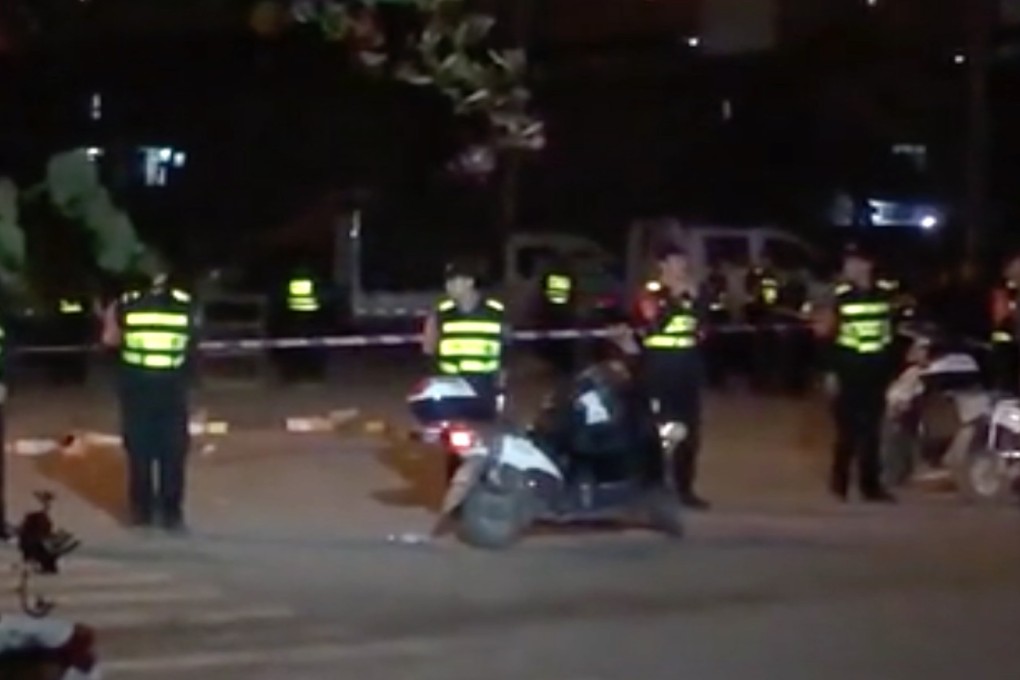 Police at the scene of the attack on a group of pedestrians in Fujian province. Photo: CNS