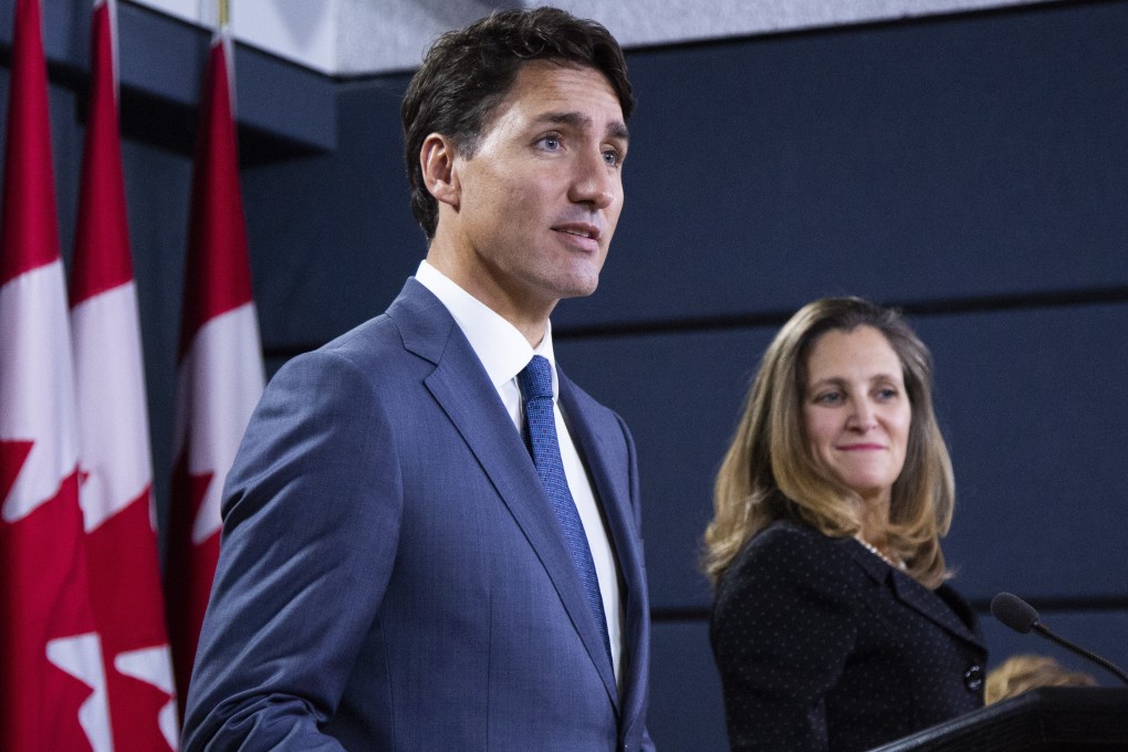 Justin Trudeau, Canada’s prime minister, speaks during a news conference last year as Chrystia Freeland, his minister of foreign affairs, listens. Photo: Bloomberg