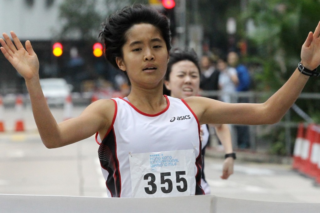 Mary Hui battles head winds to win the 2013 girl’s junior race at the International Diamond Mile in Central. Photo: Edmund Wong