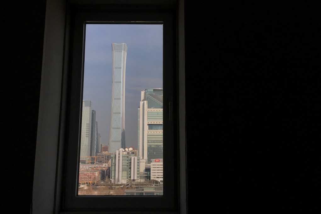 The China Zun tower and other buildings are seen through a window in Beijing’s central business district. The prospects for a resolution at the end of the 100-day truce between China and the US are dim, and the trade war is likely to widen and become a protracted battle. Photo: Reuters