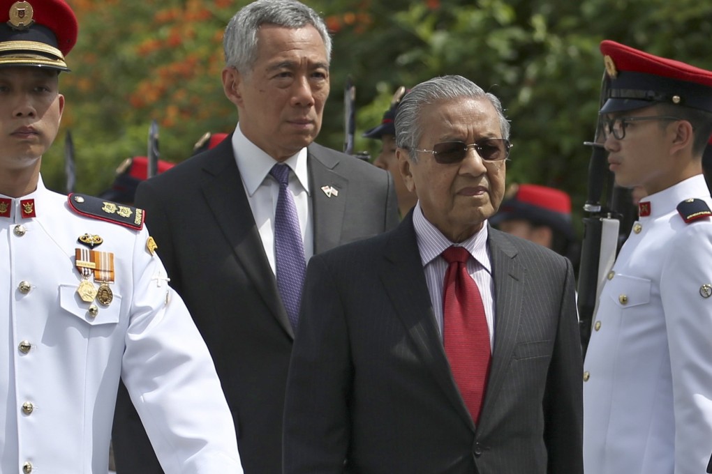 Malaysia’s Prime Minister Mahathir Bin Mohamad and Singapore’s Prime Minister Lee Hsien Loong. Photo: EPA