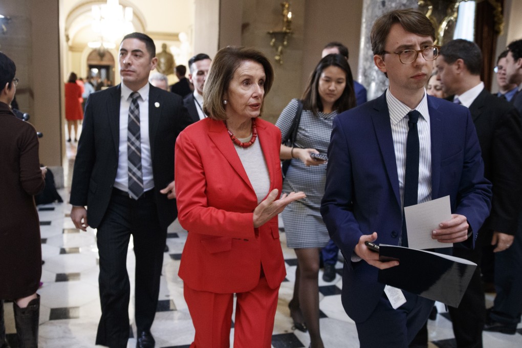 US Speaker of the House Nancy Pelosi walks through Statuary Hall in the US Capitol Capitol in Washington on Wednesday. Photo: EPA