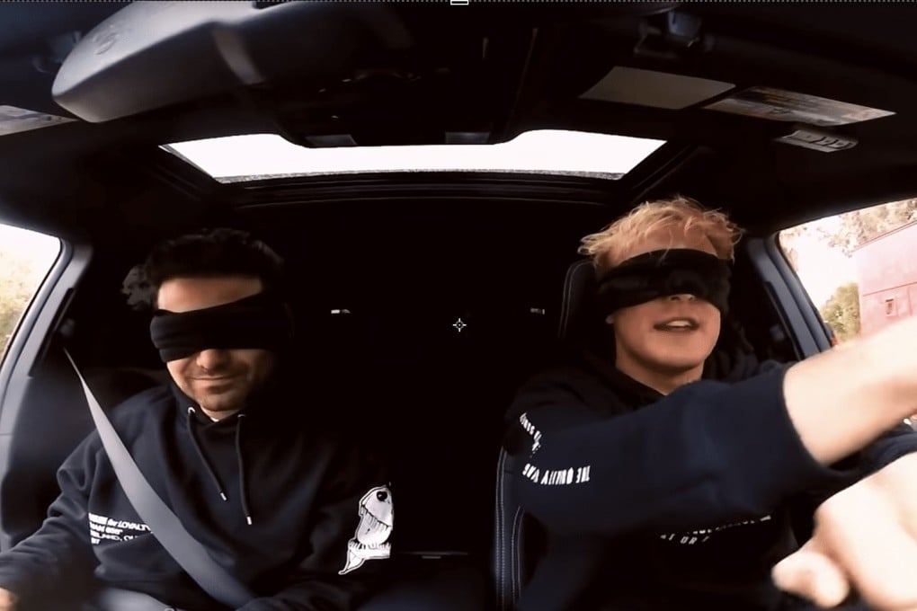 YouTubers George Janko (left) and Jake Paul (R) attempt to drive while blindfolded as part of the Bird Box challenge, based on the Netflix movie Bird Box. Photo: YouTube/Jake Paul