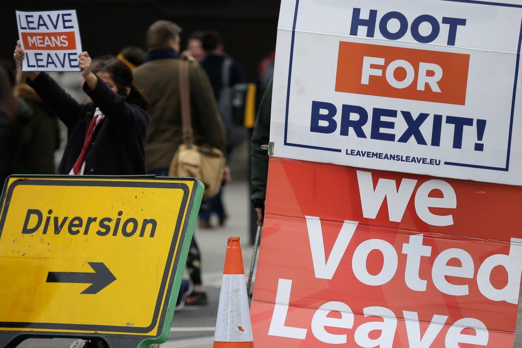 The governor of China’s central bank Yi Gang named Brexit and the US Federal Reserve’s policy as the two biggest risks to global growth in the year ahead. Photo: Xinhua