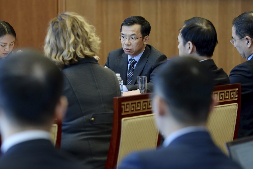 Chinese Ambassador to Canada Lu Shaye, centre, meets with journalists at the Chinese Embassy in Ottawa on Thursday. Photo: AP