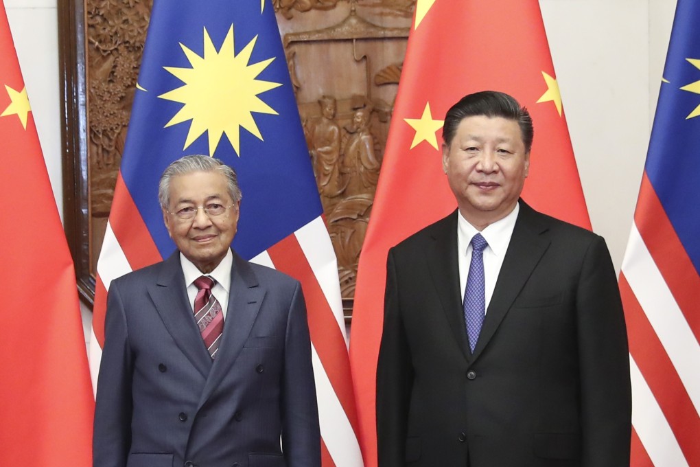 Chinese President Xi Jinping and Malaysian Prime Minister Mahathir Mohamad forged strong ties during a Beijing summit last year that remain today, according to Malaysia’s trade minister Darell Leiking. Photo: Xinhua