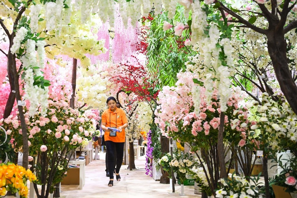 Artificial flower decorations on display at the China Import and Export Fair in Guangzhou in October. Exports and imports saw a dramatic contraction in December. Photo: Xinhua