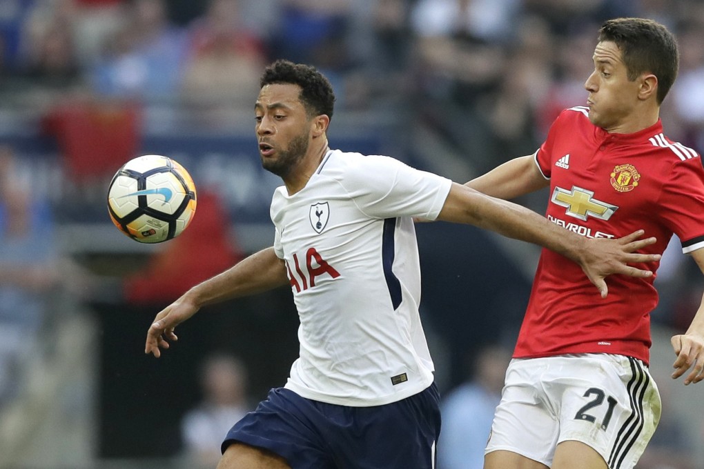 Mousa Dembele fends off Manchester United’s Ander Herrera. The Belgian has left Tottenham for the Chinese Super League. Photo: AP