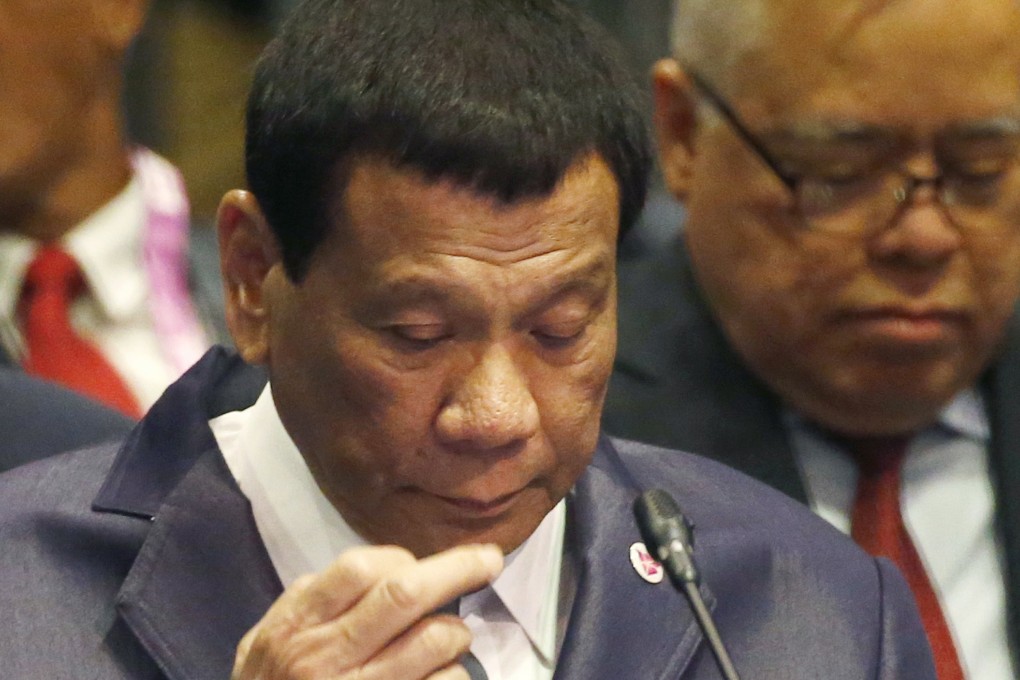 Philippine President Rodrigo Duterte listens to a speech during an Asean Plus China Summit meeting in Singapore, in November 2018. Photo: AP