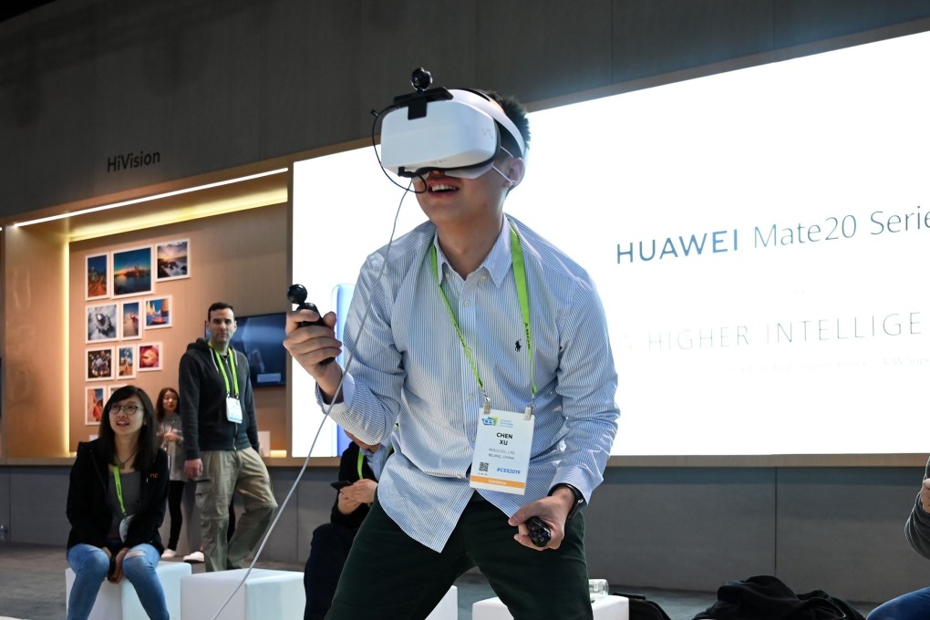An attendee plays the Huawei VR2 virtual reality music game on the last day of CES 2019, on January 11, at the Las Vegas Convention Centre in Las Vegas. Photo: AFP