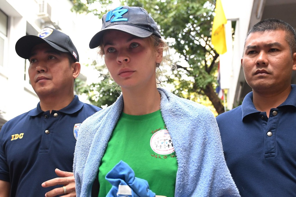 Detained Belarusian model Anastasia Vashukevich leaves Thai immigration department in Bangkok on Thursday. Photo: AFP