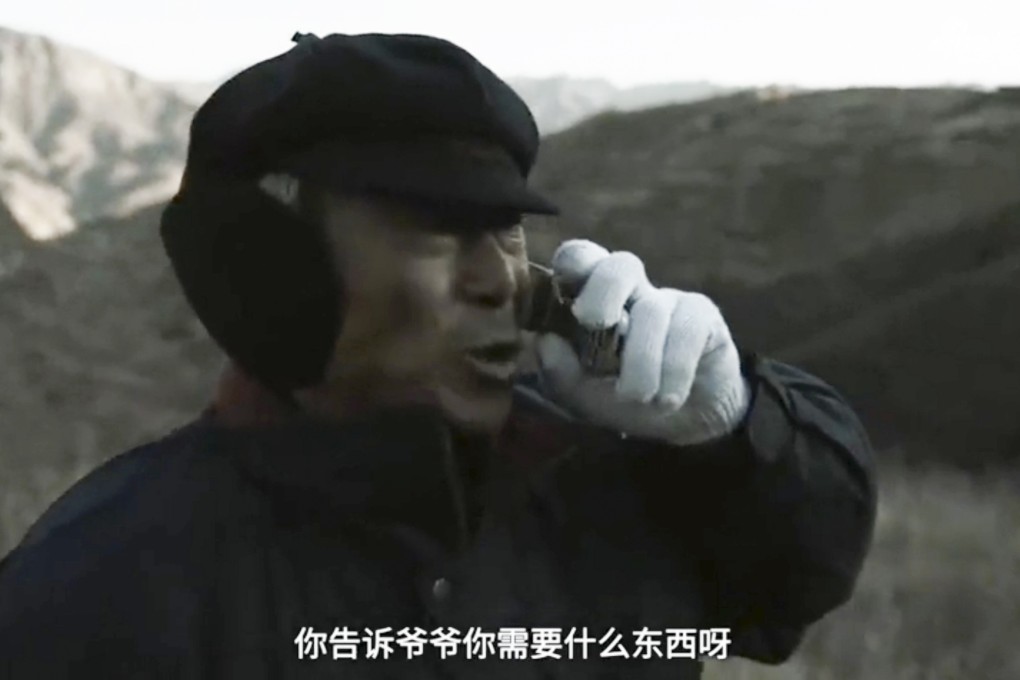 In the trailer, Li Yubao asks his grandson on the phone what he wants for the Lunar New Year. Photo: Sina.com.cn