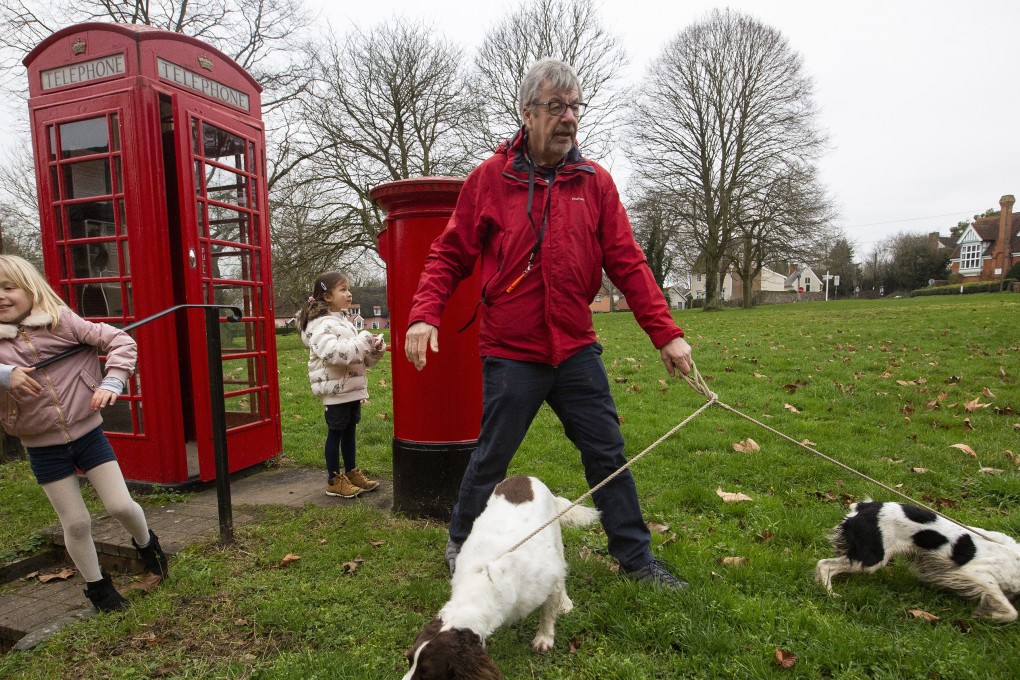 Alice (centre) with her grandfather, Ian Simpson, and a relative in a village near Bury St Edmunds, Suffolk, Britain, on January 5. Picture: Red Door News