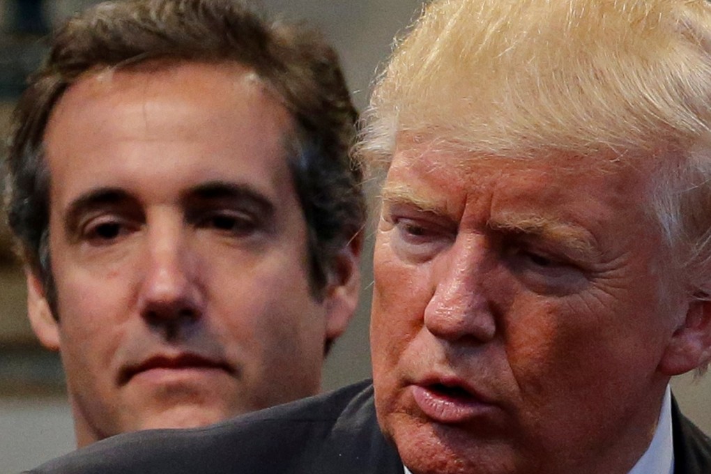 Then Republican presidential nominee Donald Trump (right) and his then personal lawyer Michael Cohen attend a prayer meeting during a campaign stop at the New Spirit Revival Centre church in Cleveland Heights, Ohio, on September 21, 2016. Photo: Reuters