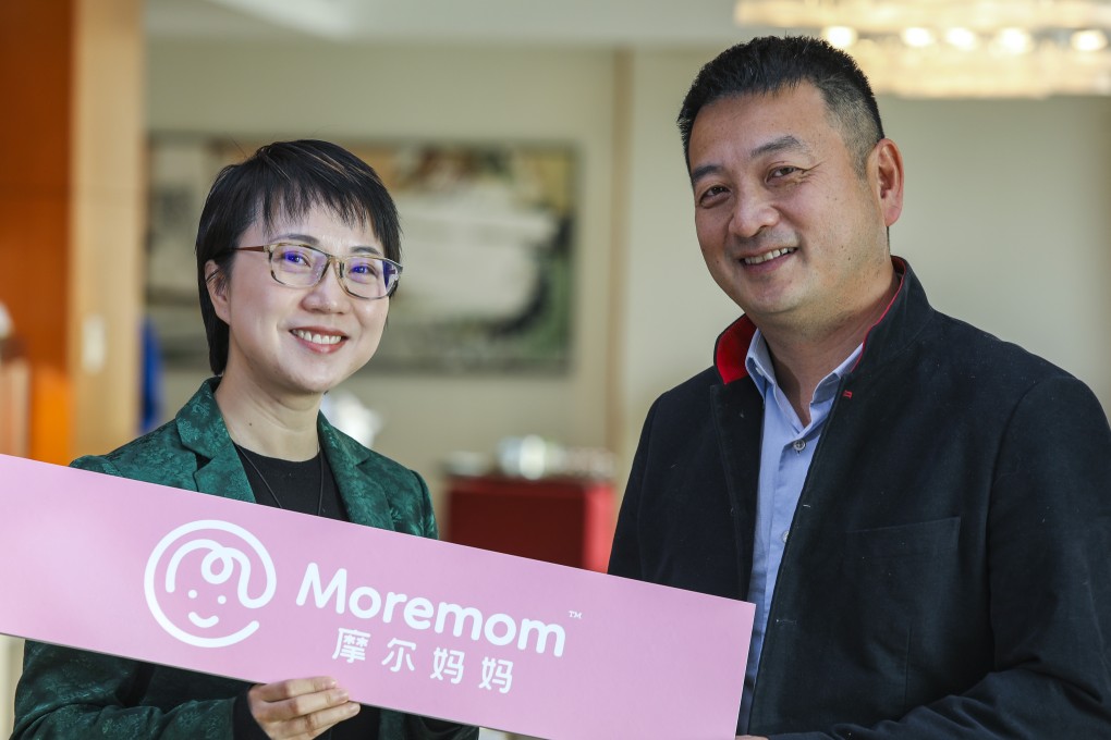 Yao Nan, left, and Liang Jianzhang, right, co-founders of MoreMom, pose for a photo in Beijing during an interview on Jan. 10, 2019. MoreMom is a lotion-based app which allows moms in China to monetize their parenting skills. 2019. 09JAN19 SCMP/ Simon Song