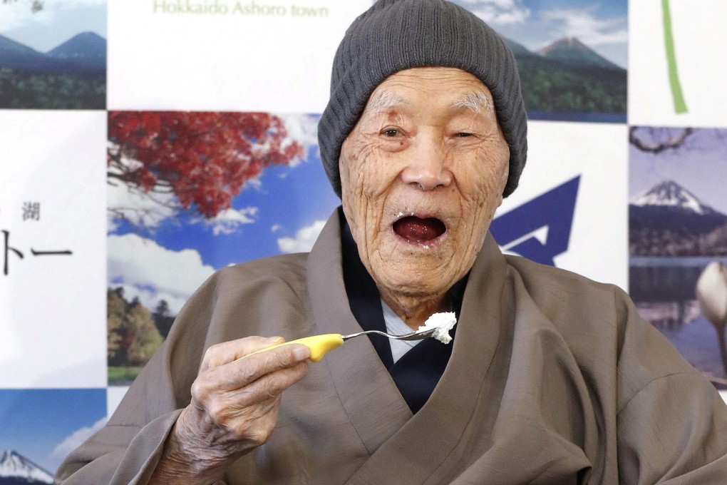 Nonaka eating his favourite cake on April 10, 2018. Photo: Kyodo/Reuters