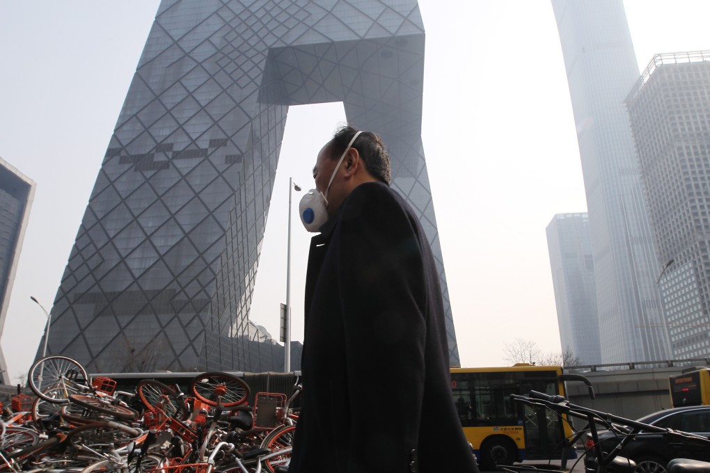 Pollution levels in major Chinese cities, like Beijing, have been shown to have a significant impact on people’s happiness in a new study. Photo: Simon Song