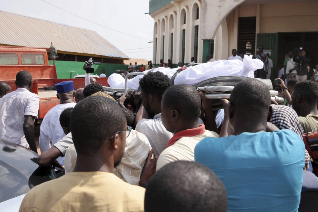 A January 18, 2019 photo of mourners carrying the body of investigative journalist Ahmed Hussein-Suale, who was shot dead by gunmen on a motorbike in Accra, Ghana. Photo: AP