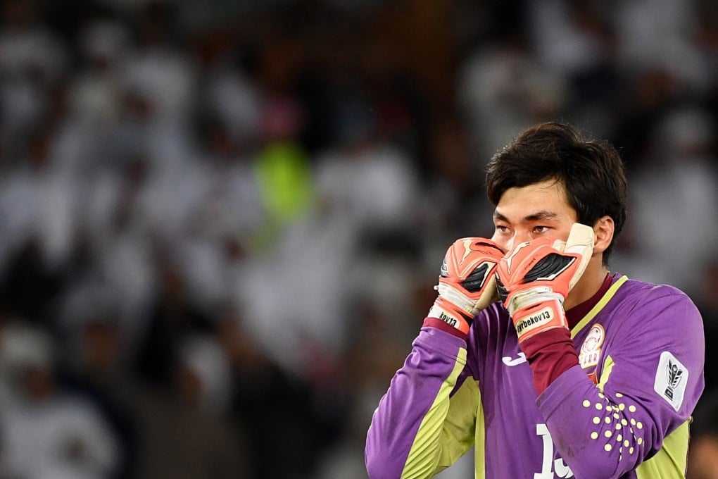 Krygyzstan goalkeeper Kadyrbekov Kutman reacts during the match against UAE. Photo: EPA