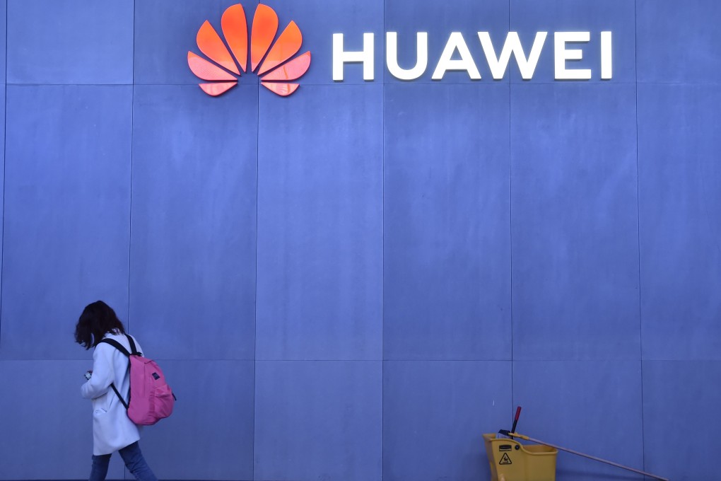 An attendee walks past the Huawei booth at CES 2019, the world's largest annual consumer technology trade show, in Las Vegas on January 8. Photo: AFP