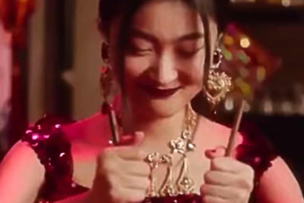 The advert showed Zuo Ye trying to eat pizza with chopsticks. Photo: YouTube / Dolce & Gabbana
