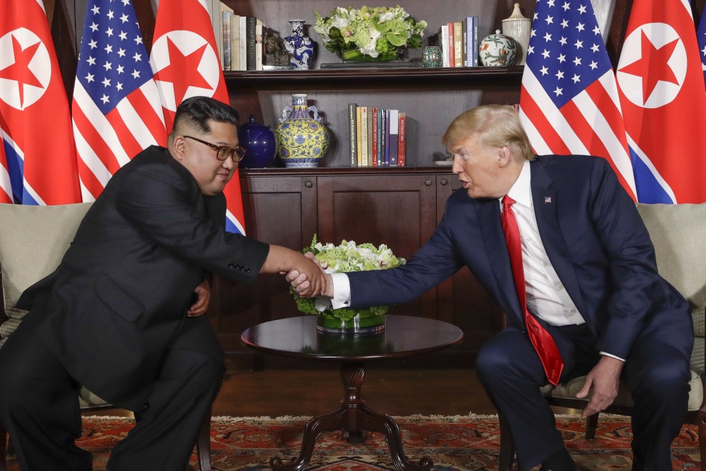 North Korea leader Kim Jong-un and US President Donald Trump shake hands during their meeting in Singapore on June 12. The historic summit drew the eyes of the world, but was criticised for resulting in no significant progress on North Korean denuclearisation. Photo: AP