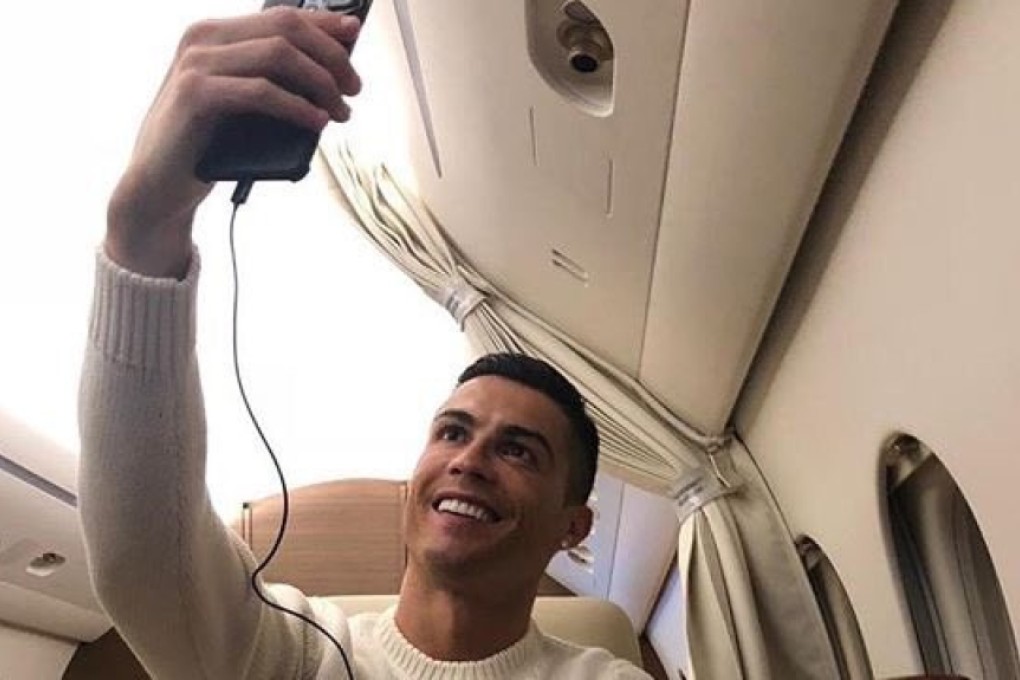 Cristiano Ronaldo poses for a selfie on his private plane. Photo: Twitter