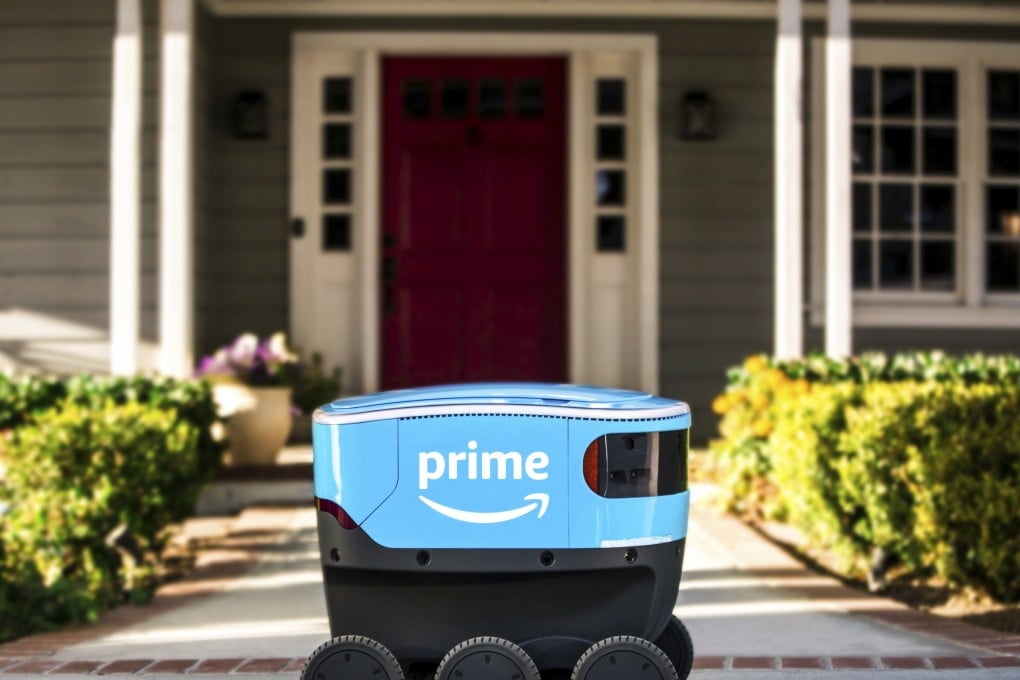 This undated photo provided by Amazon shows a self-driving delivery robot that Amazon is calling Scout. The online shopping giant says it started to test self-driving robots in Snohomish County, Wash., Wednesday, Jan. 23, 2019, that can bring Amazon packages to shoppers' doorsteps. (Amazon via AP)