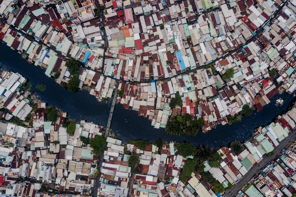 Houses along the Xuyen Tam canal in Ho Chi Minh City. Chau Van Kham is a member of the Viet Tan, an anti-government group that the authorities in Hanoi consider a terrorist organisation. Fifteen members of the group were convicted over a 2017 plot to attack Ho Chi Minh City’s airport with petrol bombs. Photo: AFP