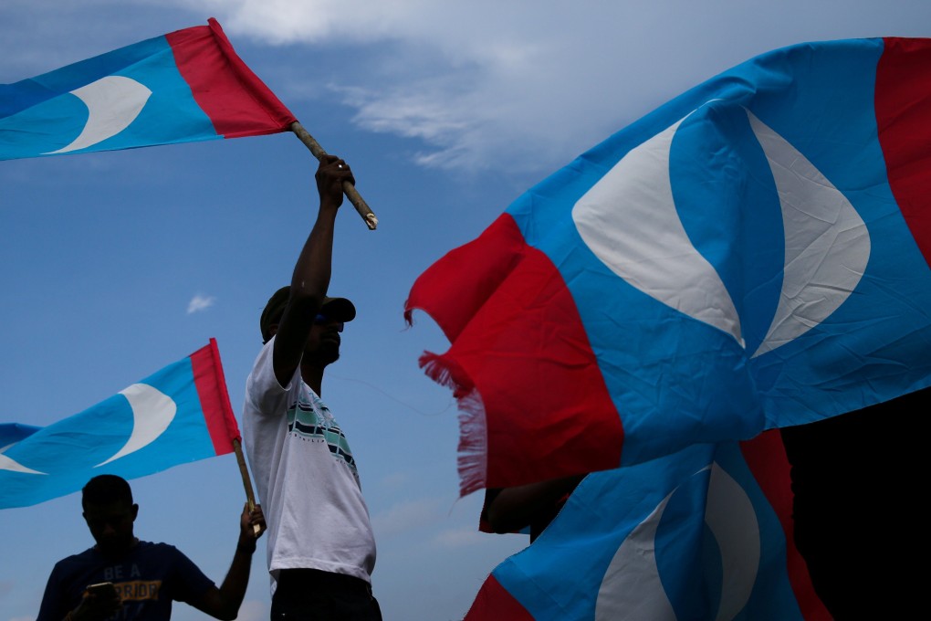 Supporters of Mahathir Mohamad the day after the election. Photo: Reuters