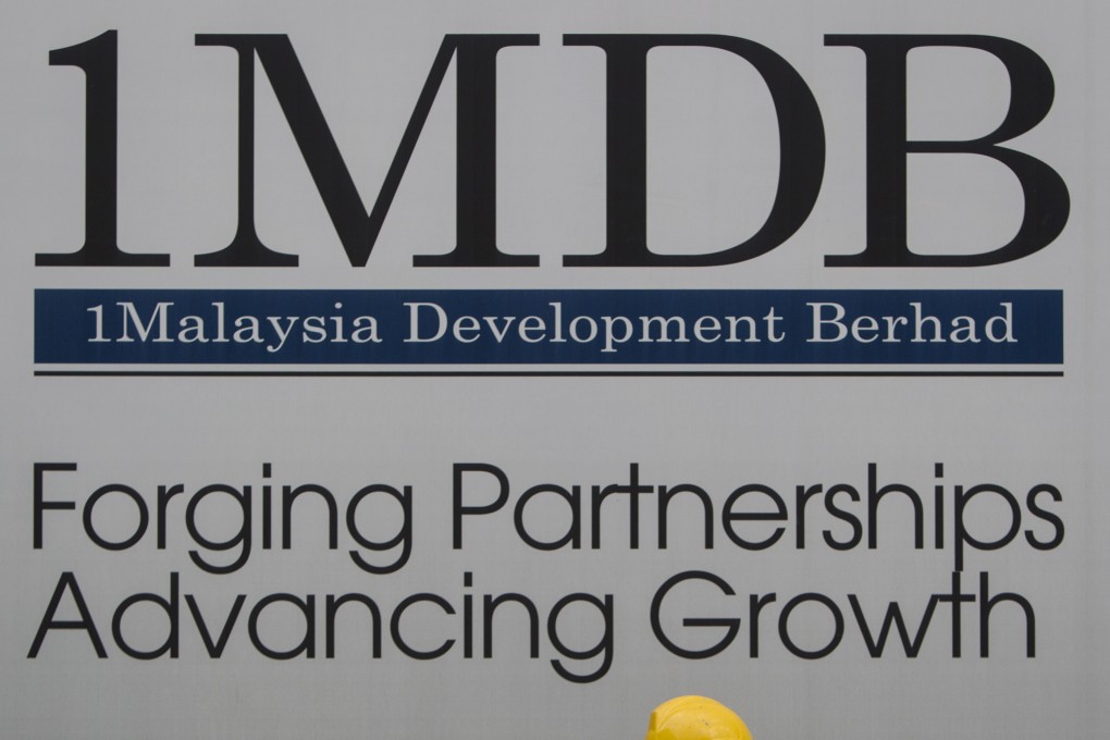 A billboard for state investment fund 1Malaysia Development Berhad. Photo: AP