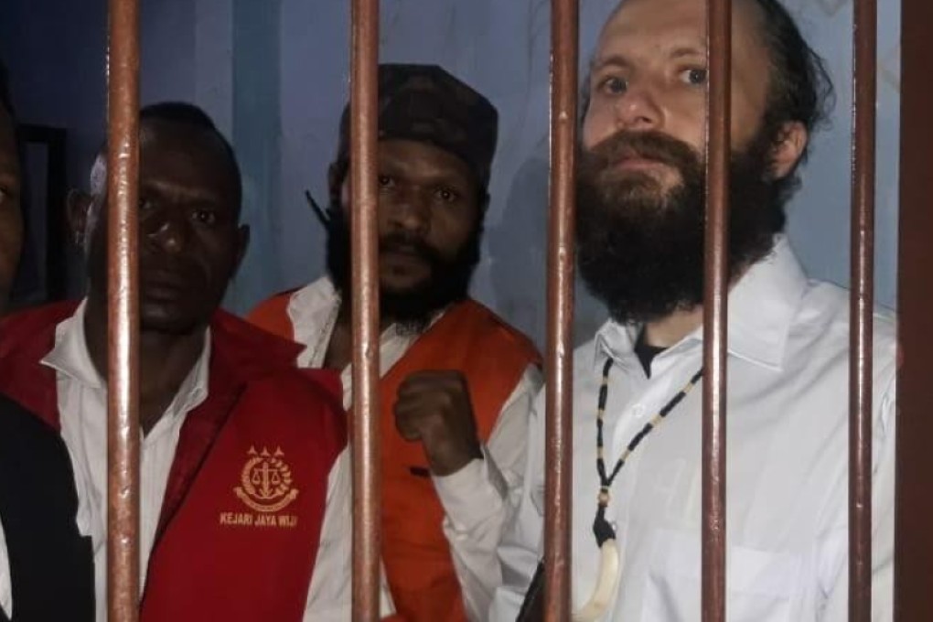 Jakob Skrzypski, who sports a bushy beard and has his hair tied back, has been held in a small, poorly-lit jail cell as he awaits trial. Photo: Febriana Firdaus