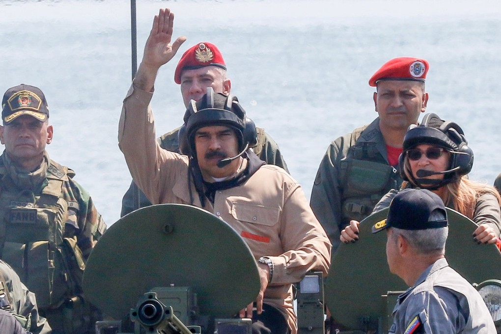 President Nicolas Maduro rides in an amphibious vehicle in Puerto Cabello, Venezuela. Photo: Reuters