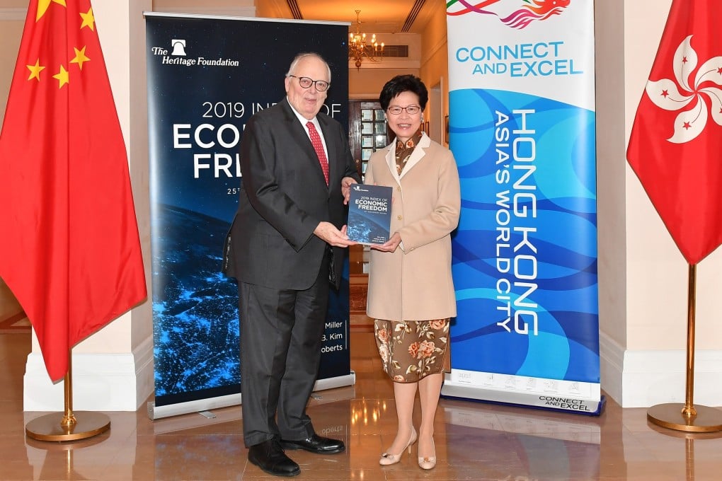 Carrie Lam with Heritage Foundation founder Edwin Feulner at Government House. Photo: Handout