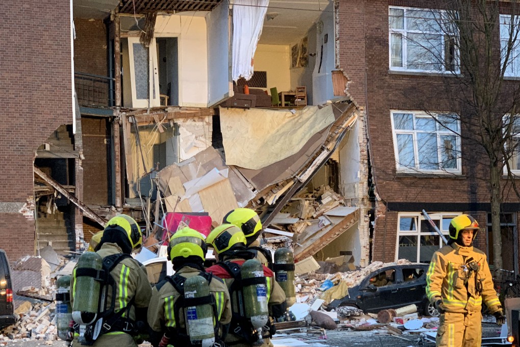 Authorities respond after a three-storey home collapsed in The Hague, Netherlands on Sunday, January 27, 2019. Photo: AP Photo