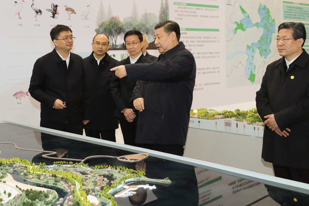 Chinese President Xi Jinping looks at a model of the planned development of the Xiongan New Area during a visit to Hebei province on January 16. Photo: Xinhua