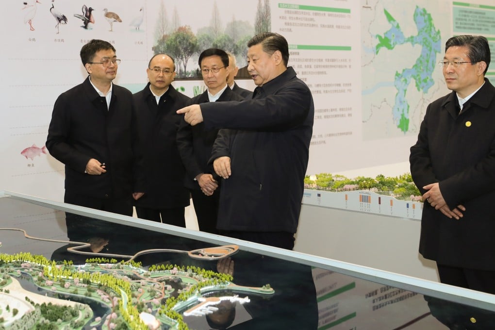 Chinese President Xi Jinping looks at a model of the planned development of the Xiongan New Area during a visit to Hebei province on January 16. Photo: Xinhua