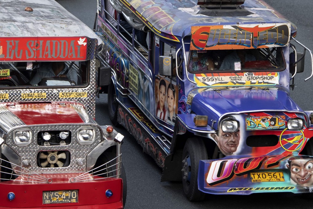 Hand-painting custom decor on jeepneys adorned with images of everything from Batman to babies, as well as disco lights and chrome wheels, have for decades provided cheap transport for millions. But pollution and safety concerns have led to a modernisation programme, with jeepneys 15 years or older to be taken off the streets by 2020. Photo: AFP