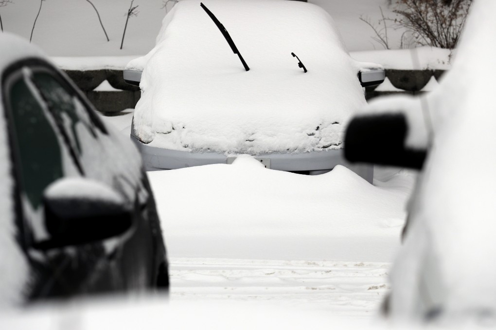 Cars covered in snow on January 28, 2019 in Wheeling, Illinois. Photo: AP